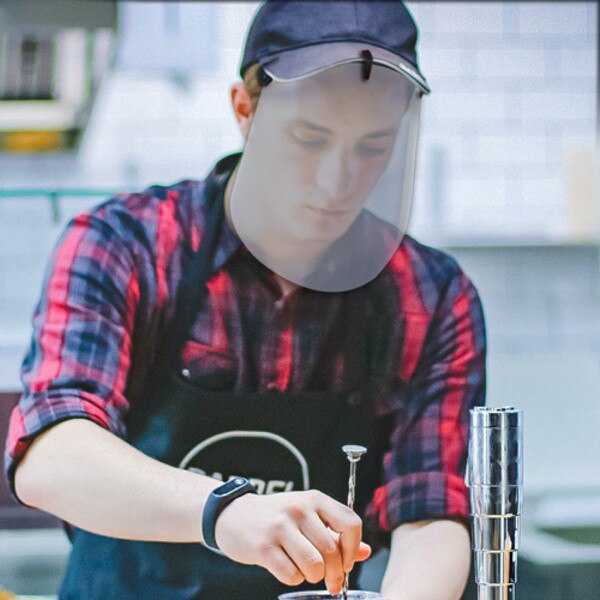 Barista wearing cap guard